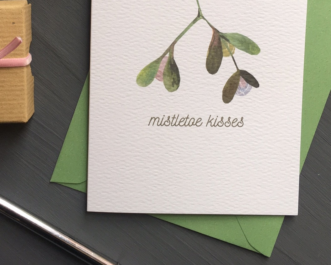 Mistletoe kisses eco Christmas card