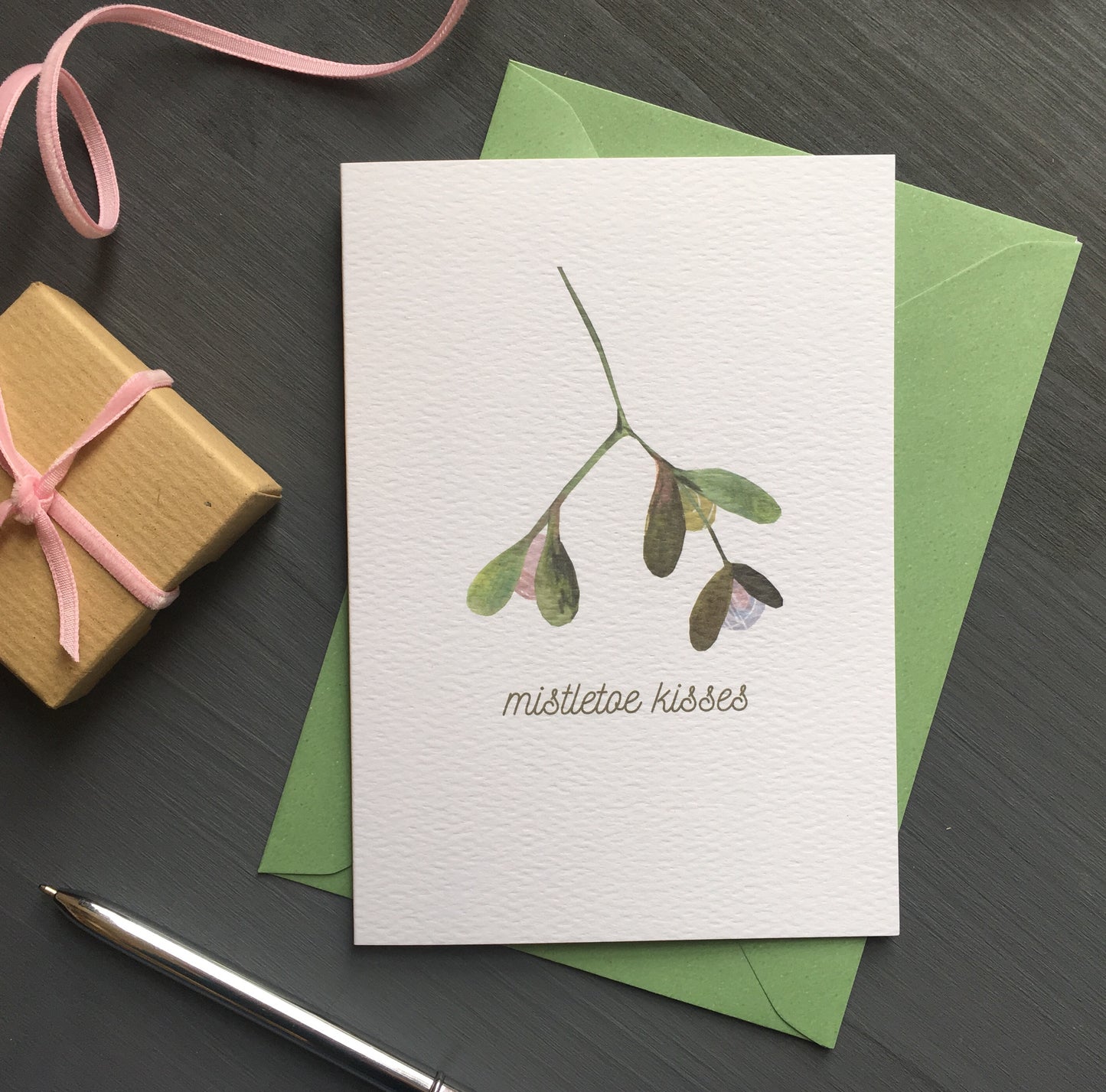 Mistletoe kisses eco Christmas card