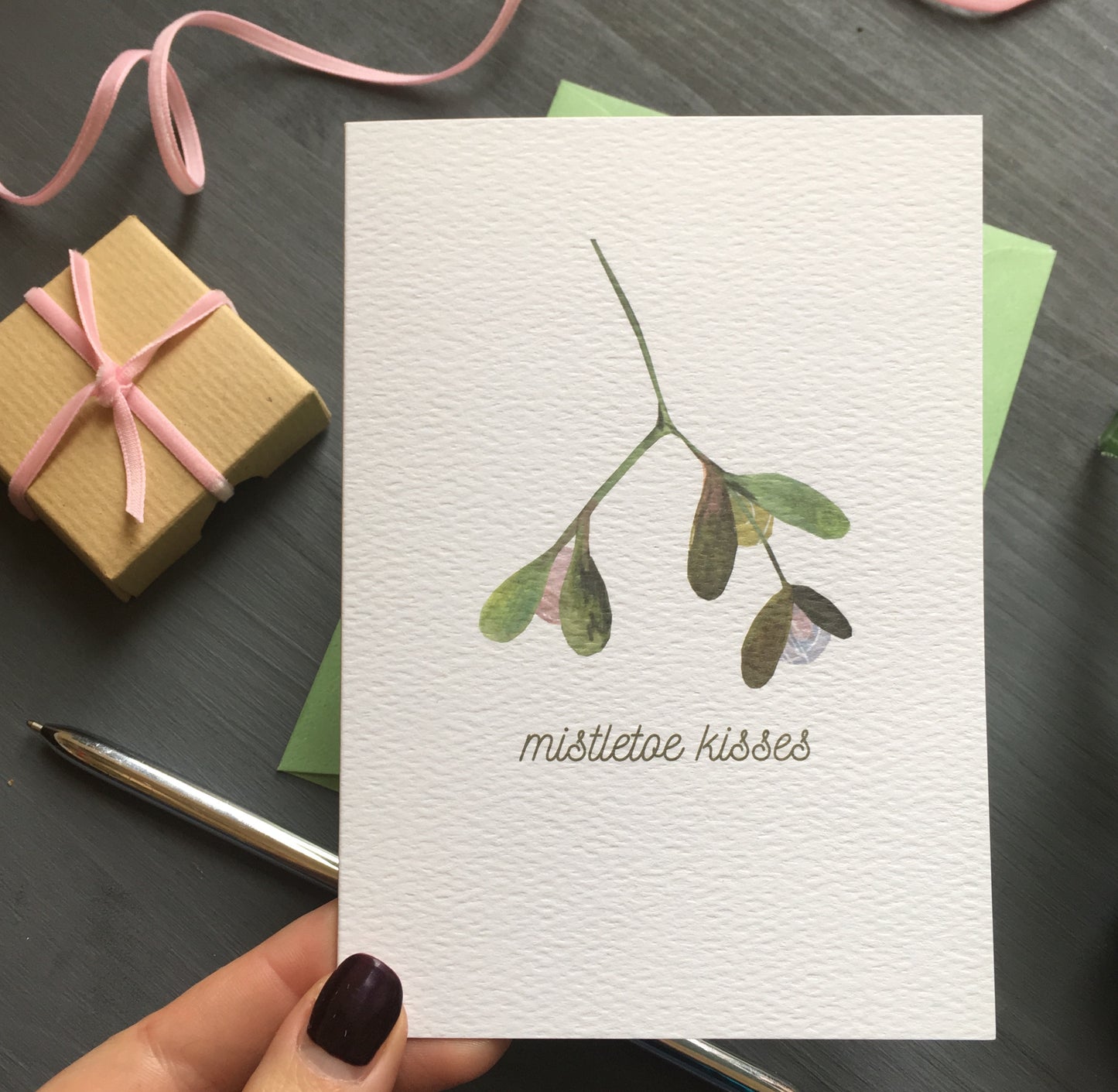 Mistletoe kisses eco Christmas card