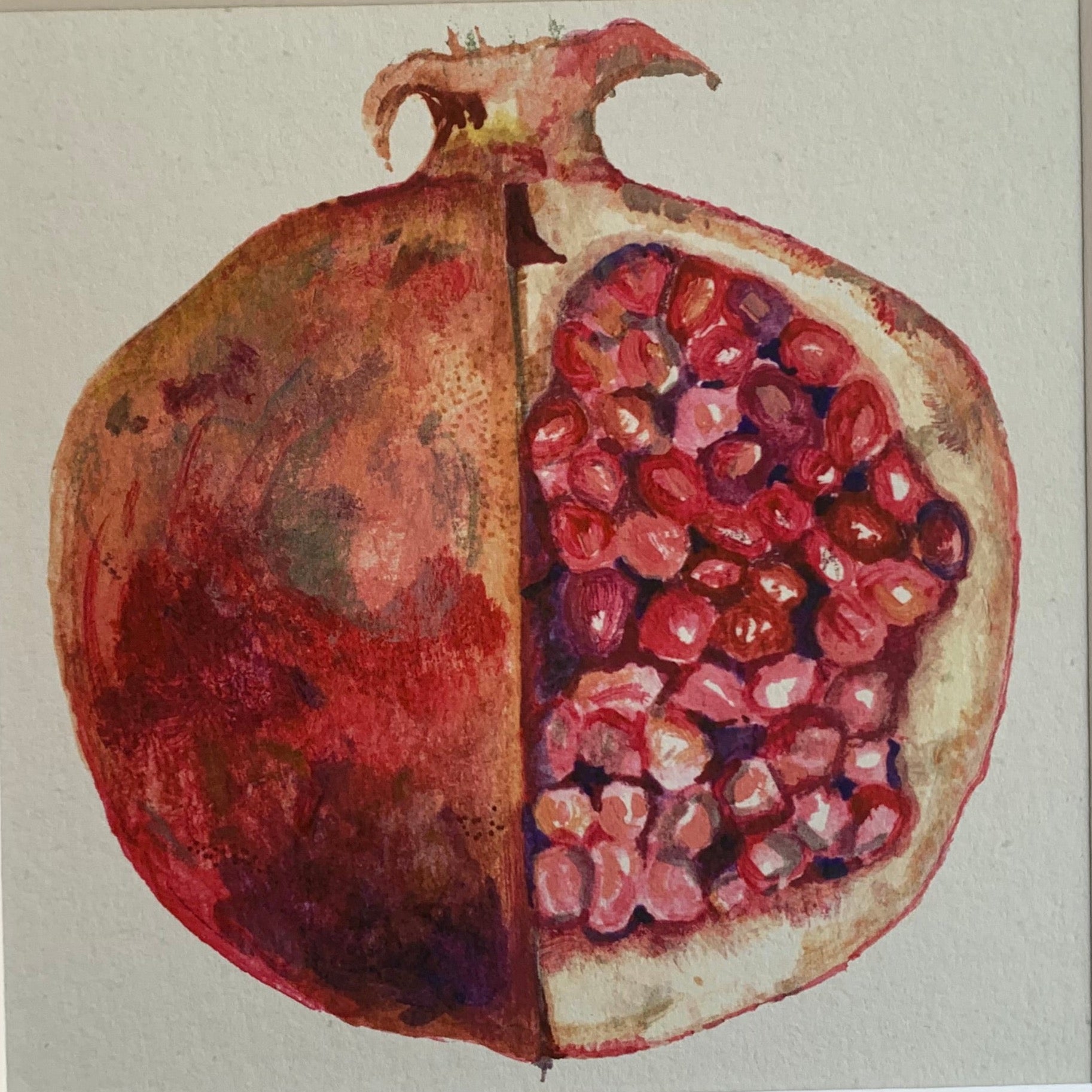 close up view of pomegranate painting showing the brushstrokes and pencil detail