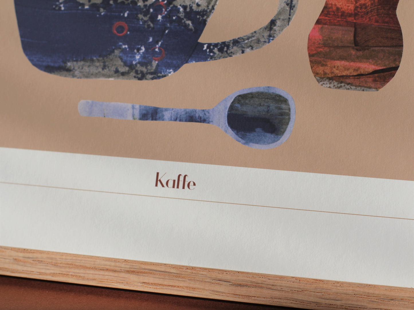 A detail of an art print for coffee lovers. The Danish word 'caffe' in modern type is pictured.