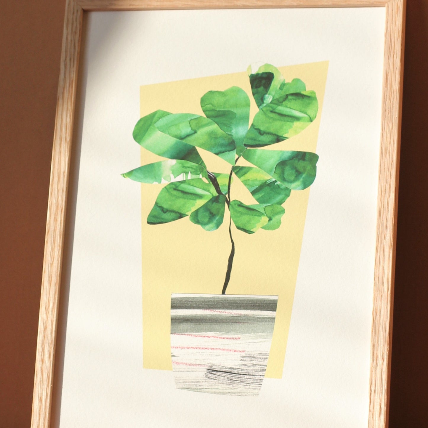 A close up detail of a houseplant art print. The detail shows the subtle colour variation of the leaves.