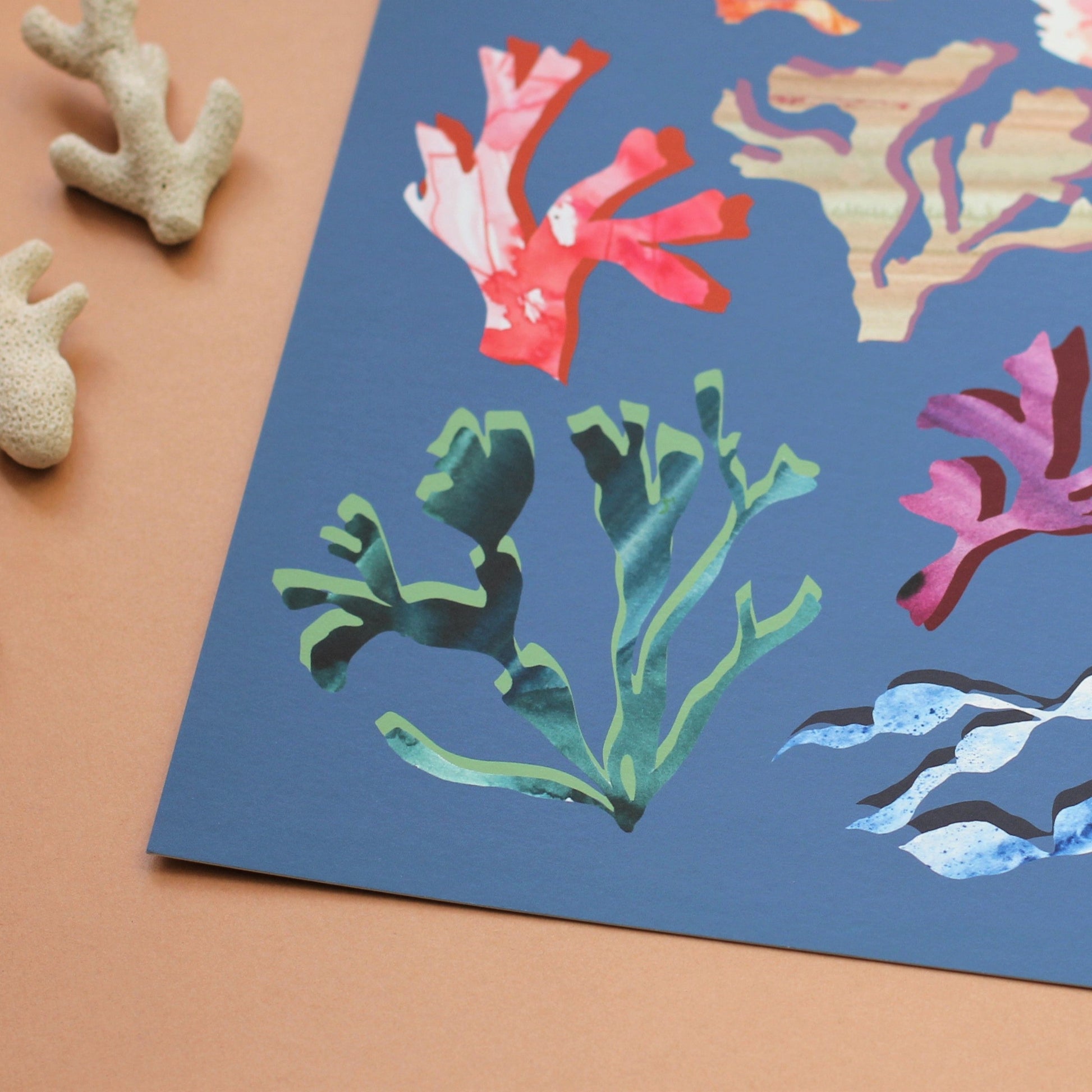 A detail of an art print of seaweeds and corals in a midcentury modern style. 